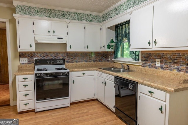 4370 Tradition Ter, Austell, GA 30106 - kitchen featuring gas range oven, dishwasher, a sink, under cabinet range hood, and crown molding