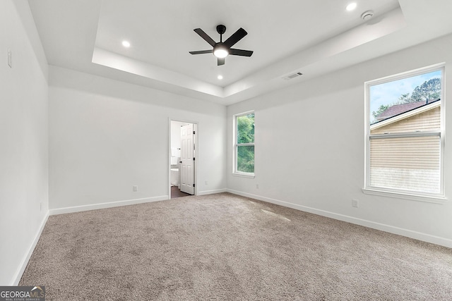8544 Plumtree Dr, Riverdale, GA 30274 - carpeted empty room with a raised ceiling, a ceiling fan, recessed lighting, baseboards, and a smoke detector