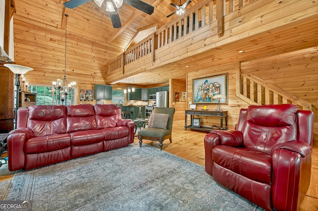 744 Dover Falls Trl, Ellijay, GA 30540 - living room with wood-type flooring, a ceiling fan, a chandelier, wood walls, and wooden ceiling