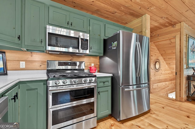 744 Dover Falls Trl, Ellijay, GA 30540 - kitchen featuring stainless steel appliances, green cabinets, light countertops, wooden ceiling, and wood walls