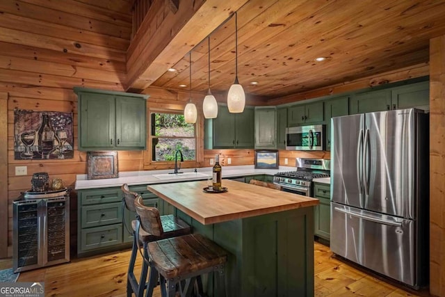 744 Dover Falls Trl, Ellijay, GA 30540 - kitchen with green cabinets, stainless steel appliances, wood counters, a sink, and beverage cooler