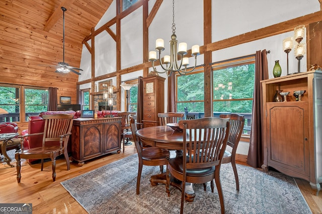 744 Dover Falls Trl, Ellijay, GA 30540 - dining area with high vaulted ceiling, light wood-style flooring, a chandelier, a wooden ceiling with exposed beams, and ceiling fan