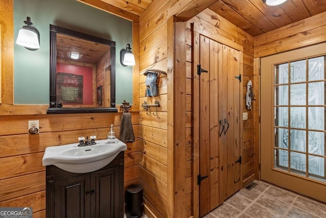 744 Dover Falls Trl, Ellijay, GA 30540 - bathroom with wood walls, vanity, and wooden ceiling