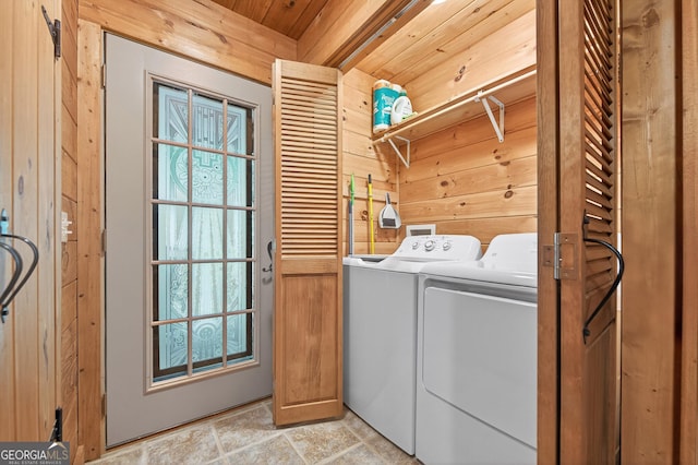 744 Dover Falls Trl, Ellijay, GA 30540 - laundry room with washing machine and dryer, wood ceiling, wood walls, and light stone finish floors
