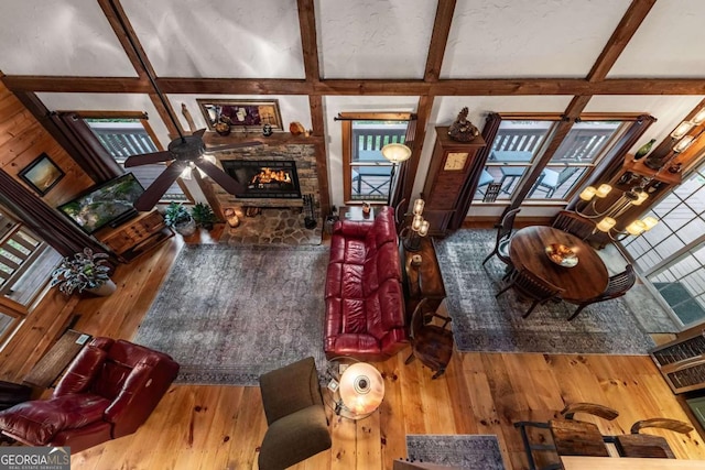 744 Dover Falls Trl, Ellijay, GA 30540 - living area with beam ceiling, wood-type flooring, a fireplace, and ceiling fan