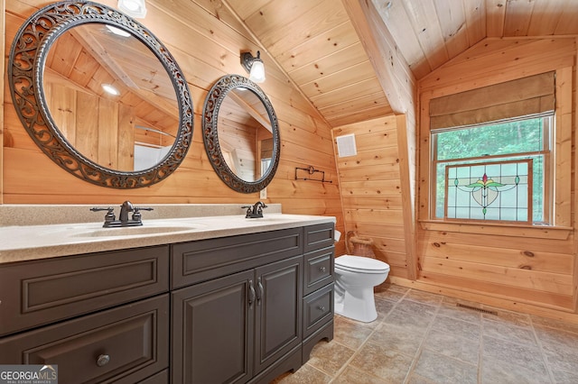 744 Dover Falls Trl, Ellijay, GA 30540 - bathroom featuring vaulted ceiling, wood walls, stone finish floors, wooden ceiling, and double vanity