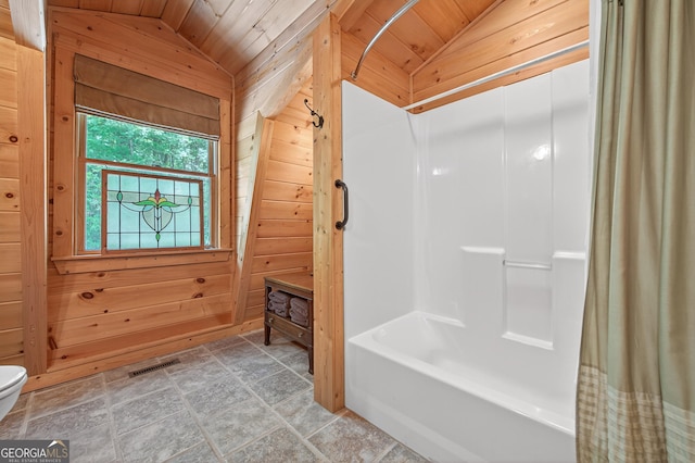 744 Dover Falls Trl, Ellijay, GA 30540 - full bathroom featuring vaulted ceiling, wood walls, wooden ceiling, shower / tub combo, and stone finish floors