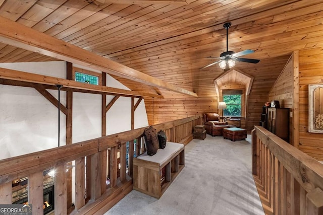 744 Dover Falls Trl, Ellijay, GA 30540 - sitting room with vaulted ceiling, ceiling fan, wooden walls, wood ceiling, and carpet flooring