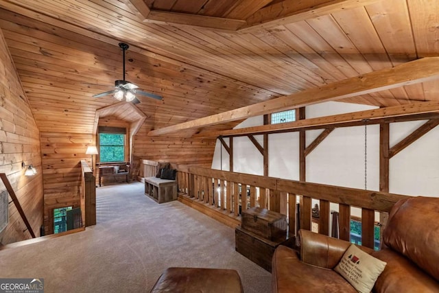 744 Dover Falls Trl, Ellijay, GA 30540 - living area featuring lofted ceiling, ceiling fan, wooden ceiling, carpet floors, and wood walls