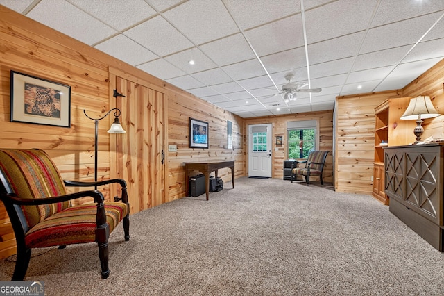 744 Dover Falls Trl, Ellijay, GA 30540 - living area featuring wooden walls, carpet floors, ceiling fan, a drop ceiling, and recessed lighting
