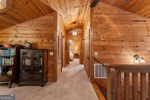 744 Dover Falls Trl, Ellijay, GA 30540 - corridor featuring lofted ceiling, wooden ceiling, wood walls, and carpet flooring
