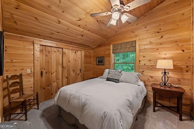 744 Dover Falls Trl, Ellijay, GA 30540 - carpeted bedroom with vaulted ceiling, wood walls, wooden ceiling, and ceiling fan