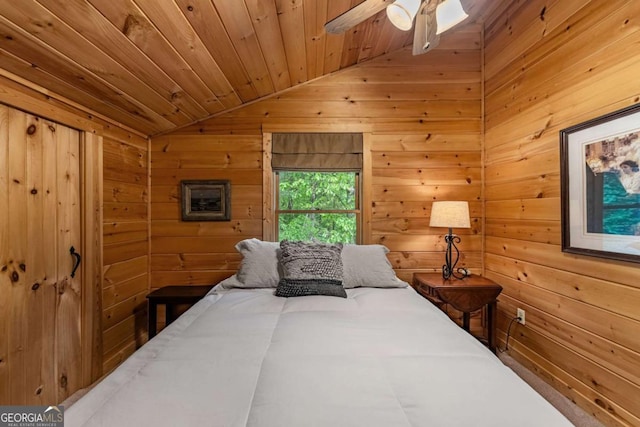 744 Dover Falls Trl, Ellijay, GA 30540 - bedroom with vaulted ceiling, wooden walls, wood ceiling, and a ceiling fan