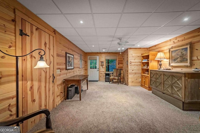 744 Dover Falls Trl, Ellijay, GA 30540 - living area featuring carpet floors, wood walls, ceiling fan, recessed lighting, and a paneled ceiling