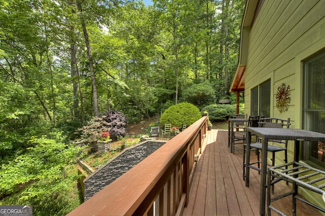 744 Dover Falls Trl, Ellijay, GA 30540 - deck featuring outdoor dining area and a wooded view