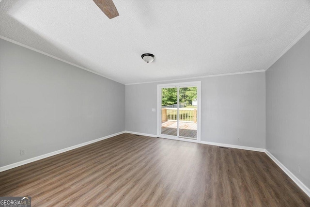 165 Forest Hill Dr, Eatonton, GA 31024 - unfurnished room featuring a textured ceiling, crown molding, wood finished floors, baseboards, and a ceiling fan