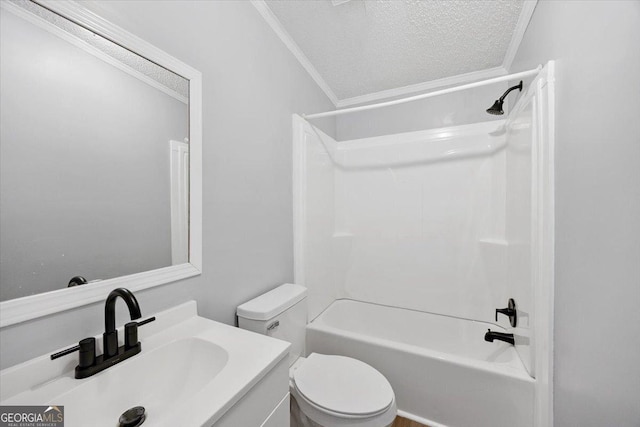165 Forest Hill Dr, Eatonton, GA 31024 - bathroom with ornamental molding, vanity, bathtub / shower combination, toilet, and a textured ceiling