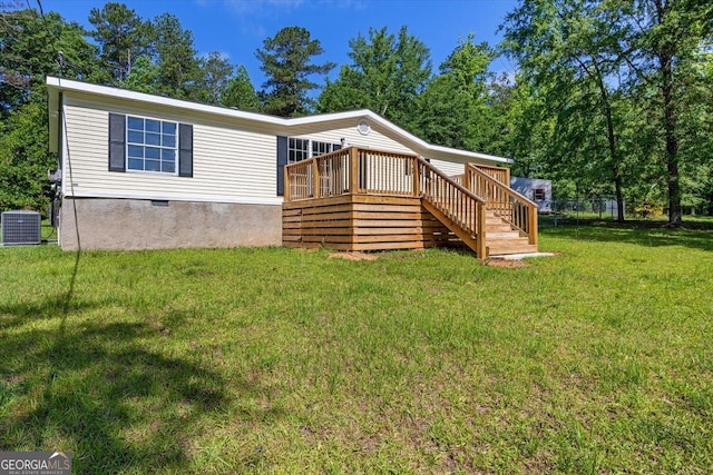 165 Forest Hill Dr, Eatonton, GA 31024 - rear view of house featuring a wooden deck, stairway, crawl space, a lawn, and central air condition unit