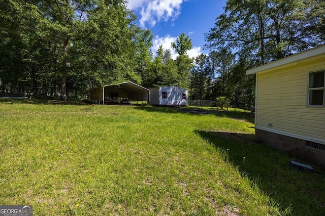 165 Forest Hill Dr, Eatonton, GA 31024 - view of yard with a carport and a shed
