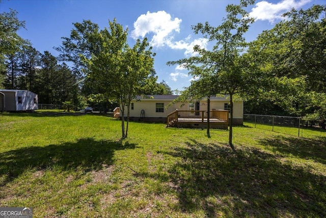 165 Forest Hill Dr, Eatonton, GA 31024 - view of yard featuring a wooden deck