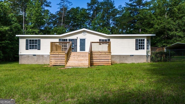 165 Forest Hill Dr, Eatonton, GA 31024 - manufactured / mobile home featuring crawl space, stairway, a deck, and a front yard