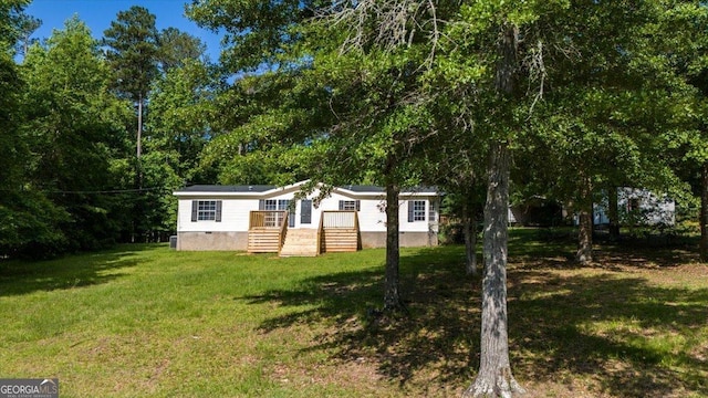 165 Forest Hill Dr, Eatonton, GA 31024 - manufactured / mobile home with a front lawn