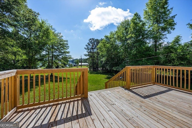 165 Forest Hill Dr, Eatonton, GA 31024 - wooden terrace featuring a yard and view of wooded area