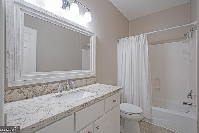 1521 Walthour Rd, Savannah, GA 31410 - bathroom with toilet, vanity, shower / bath combination with curtain, and wood finished floors