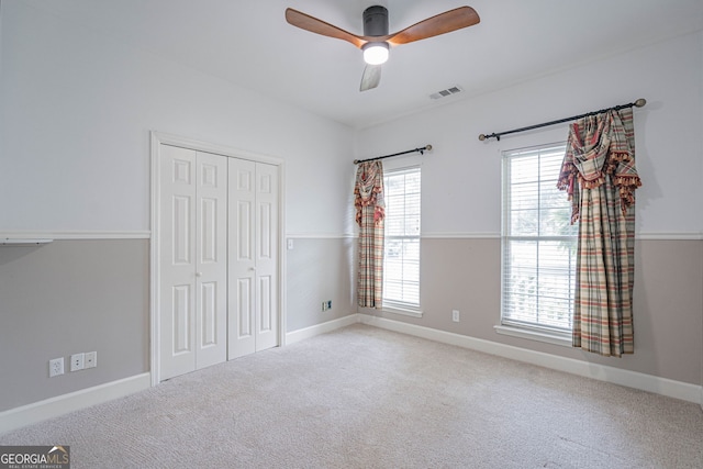 1521 Walthour Rd, Savannah, GA 31410 - unfurnished bedroom with carpet, a closet, ceiling fan, and baseboards