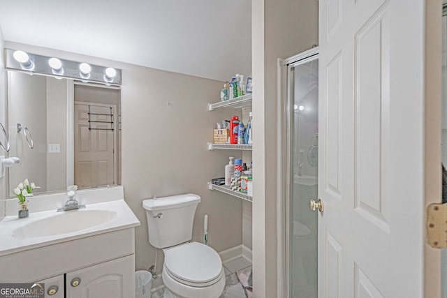 1521 Walthour Rd, Savannah, GA 31410 - bathroom featuring vanity, toilet, a stall shower, and baseboards