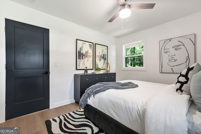 3337 Toney Dr, Decatur, GA 30032 - bedroom with wood finished floors, a ceiling fan, and baseboards