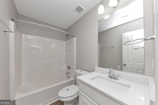 11827 Spring Lake Way, Fayetteville, GA 30215 - bathroom featuring toilet, vanity, and shower / tub combination