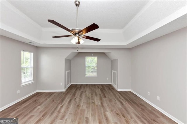 11827 Spring Lake Way, Fayetteville, GA 30215 - bonus room featuring healthy amount of natural light, wood finished floors, ceiling fan, and a textured ceiling