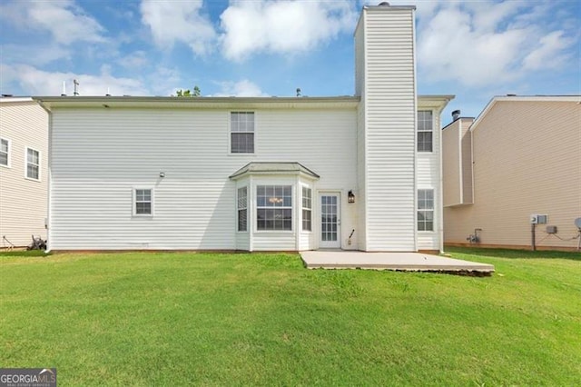 11827 Spring Lake Way, Fayetteville, GA 30215 - rear view of property featuring a patio, a chimney, and a lawn