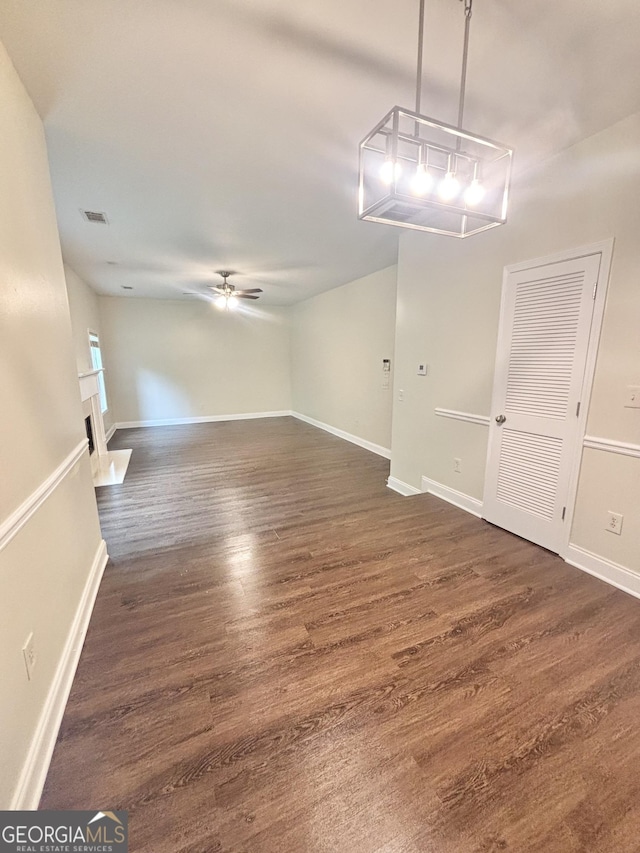 759 Hennepin Ter, Mcdonough, GA 30253 - empty room featuring ceiling fan, dark wood-type flooring, and baseboards