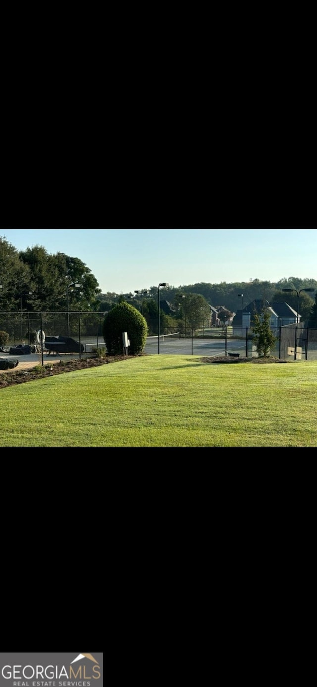 759 Hennepin Ter, Mcdonough, GA 30253 - view of community featuring a tennis court