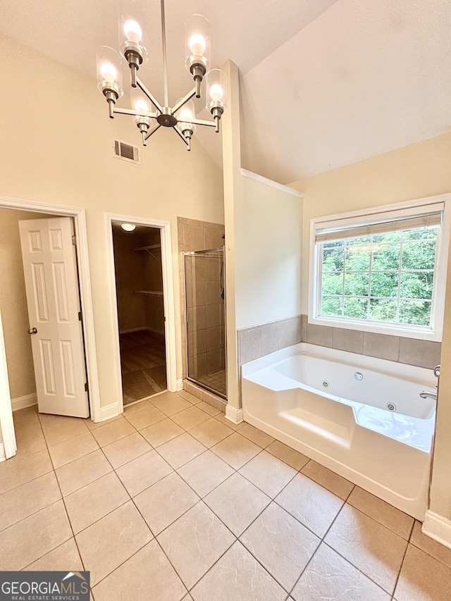 759 Hennepin Ter, Mcdonough, GA 30253 - full bath with tile patterned flooring, a chandelier, a tub with jets, a stall shower, and lofted ceiling