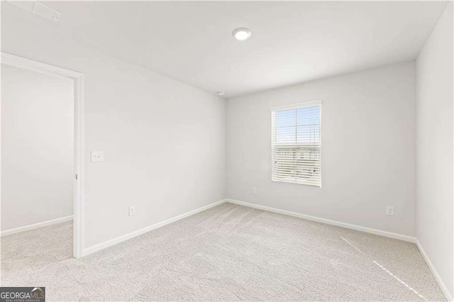7193 Brushwood Bnd, Lithonia, GA 30058 - unfurnished room featuring carpet floors and baseboards