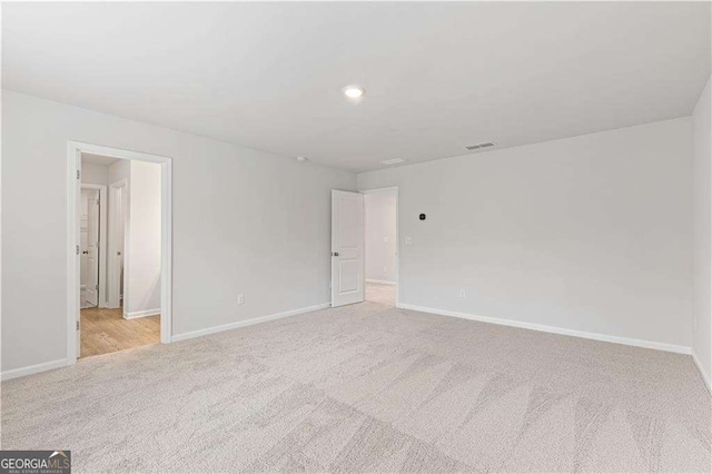 7193 Brushwood Bnd, Lithonia, GA 30058 - empty room featuring carpet flooring, baseboards, and recessed lighting