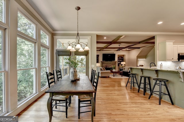 3715 Horizon Ct, Cumming, GA 30041 - dining room featuring a fireplace, coffered ceiling, ceiling fan, light wood finished floors, and recessed lighting
