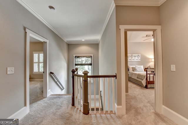 3715 Horizon Ct, Cumming, GA 30041 - hallway with an upstairs landing, carpet, ornamental molding, and healthy amount of natural light