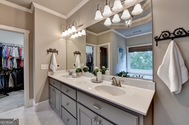 3715 Horizon Ct, Cumming, GA 30041 - bathroom featuring double vanity, a walk in closet, ornamental molding, tile patterned floors, and a chandelier
