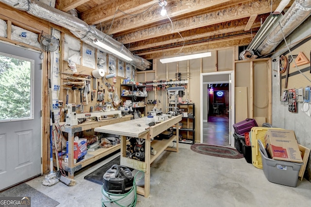 3715 Horizon Ct, Cumming, GA 30041 - below grade area featuring a workshop area