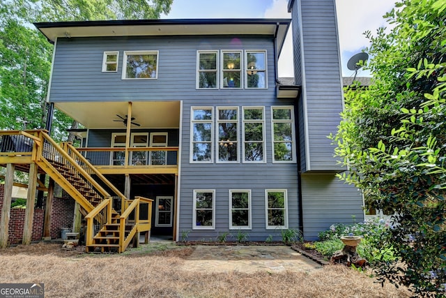 3715 Horizon Ct, Cumming, GA 30041 - rear view of property with a ceiling fan, stairway, a deck, and a chimney