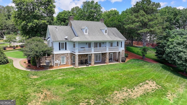 3715 Horizon Ct, Cumming, GA 30041 - back of house with a patio, a lawn, stone siding, a chimney, and french doors