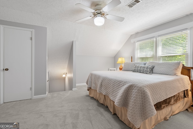 1850 Linnet Ct NE, Roswell, GA 30075 - bedroom with a textured ceiling, light carpet, lofted ceiling, baseboards, and ceiling fan