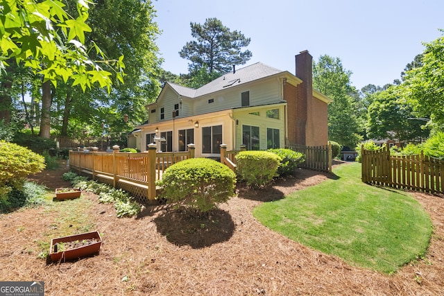 1850 Linnet Ct NE, Roswell, GA 30075 - rear view of house featuring a chimney and a deck