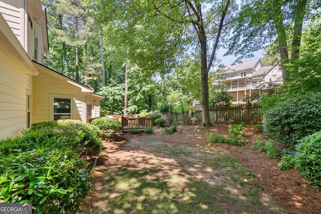 1850 Linnet Ct NE, Roswell, GA 30075 - view of yard with a wooden deck