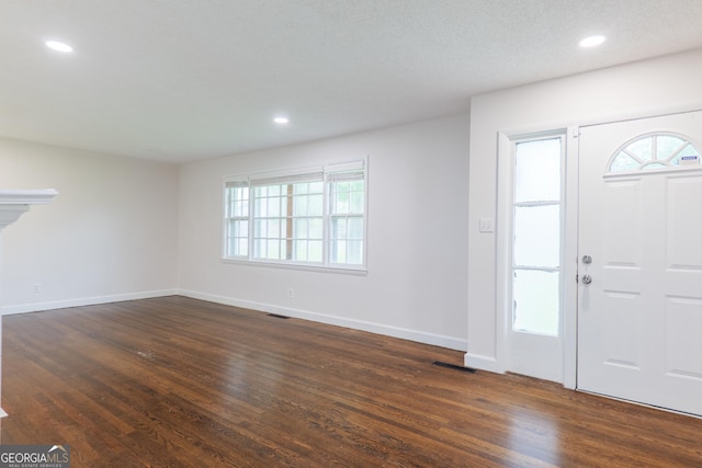 215 E Main St, Hahira, GA 31632 - entryway featuring dark wood-type flooring, plenty of natural light, recessed lighting, and baseboards