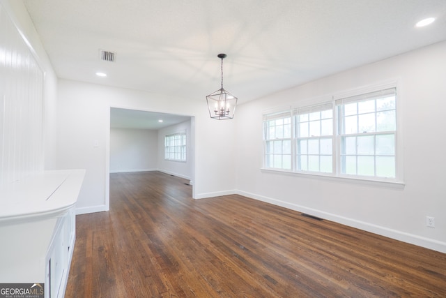 215 E Main St, Hahira, GA 31632 - unfurnished dining area with dark wood-type flooring, baseboards, a chandelier, and recessed lighting